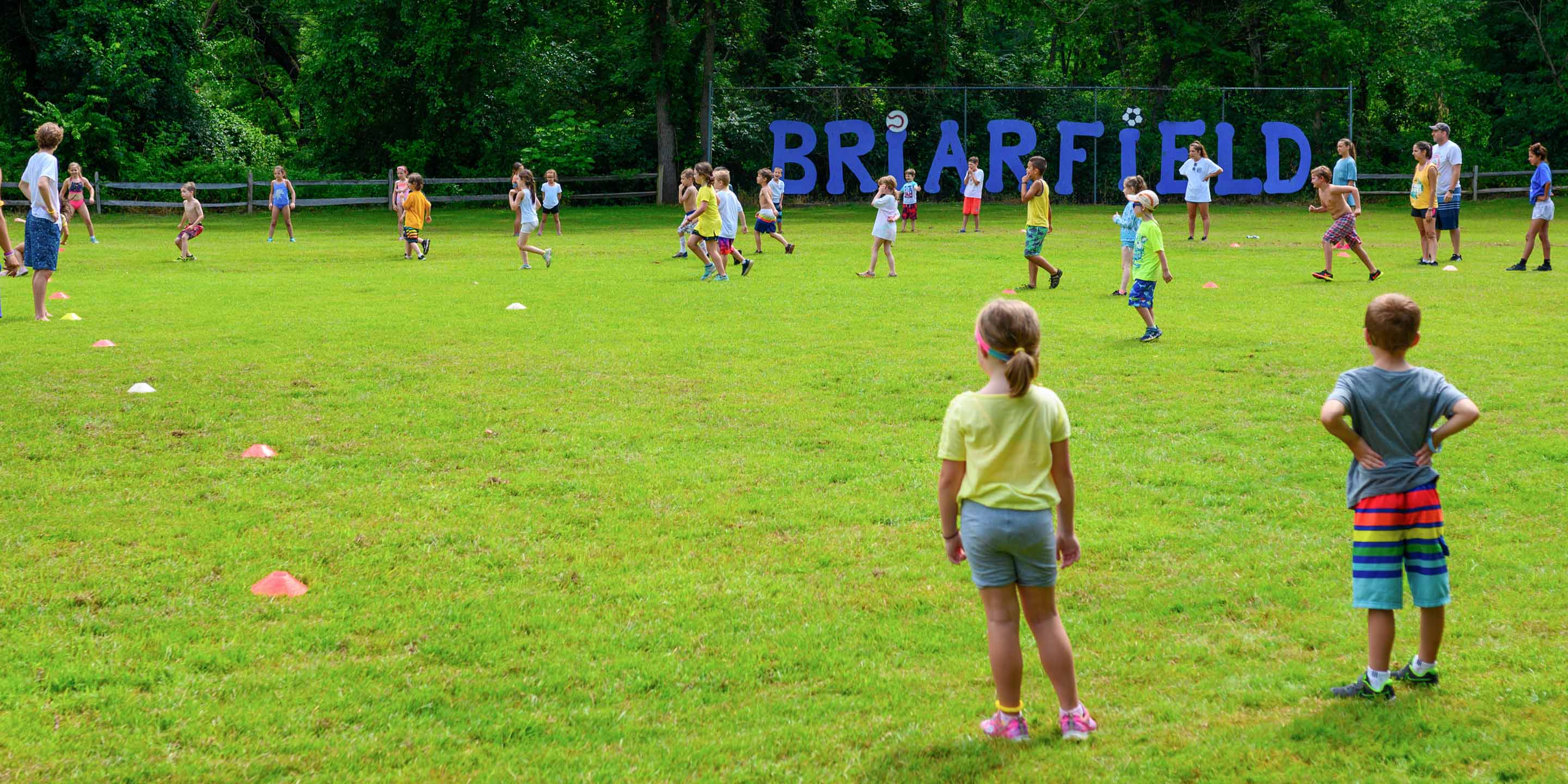Young campers playing a game on the Briarfield