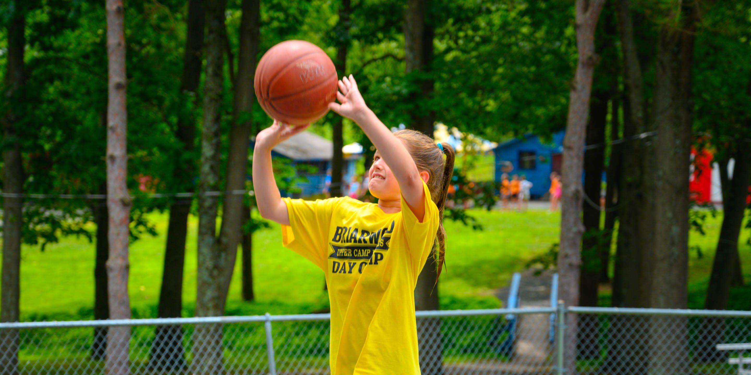 Camper playing basketball