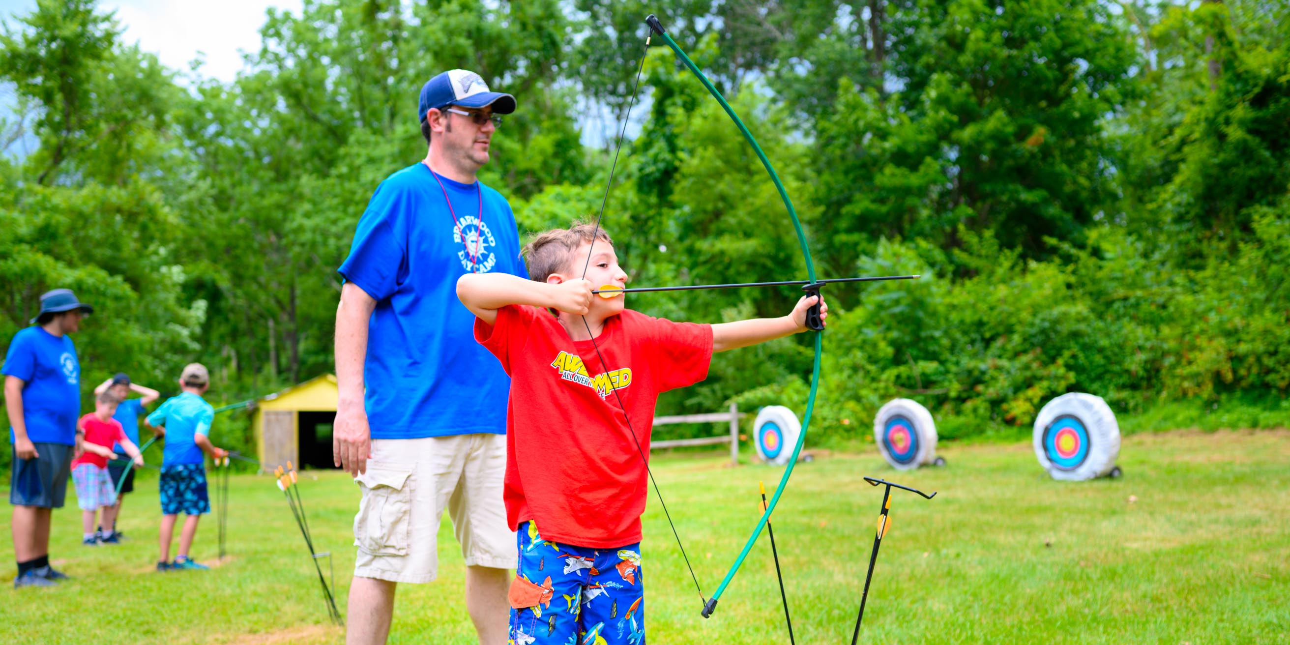 Camper shooting archery arrow