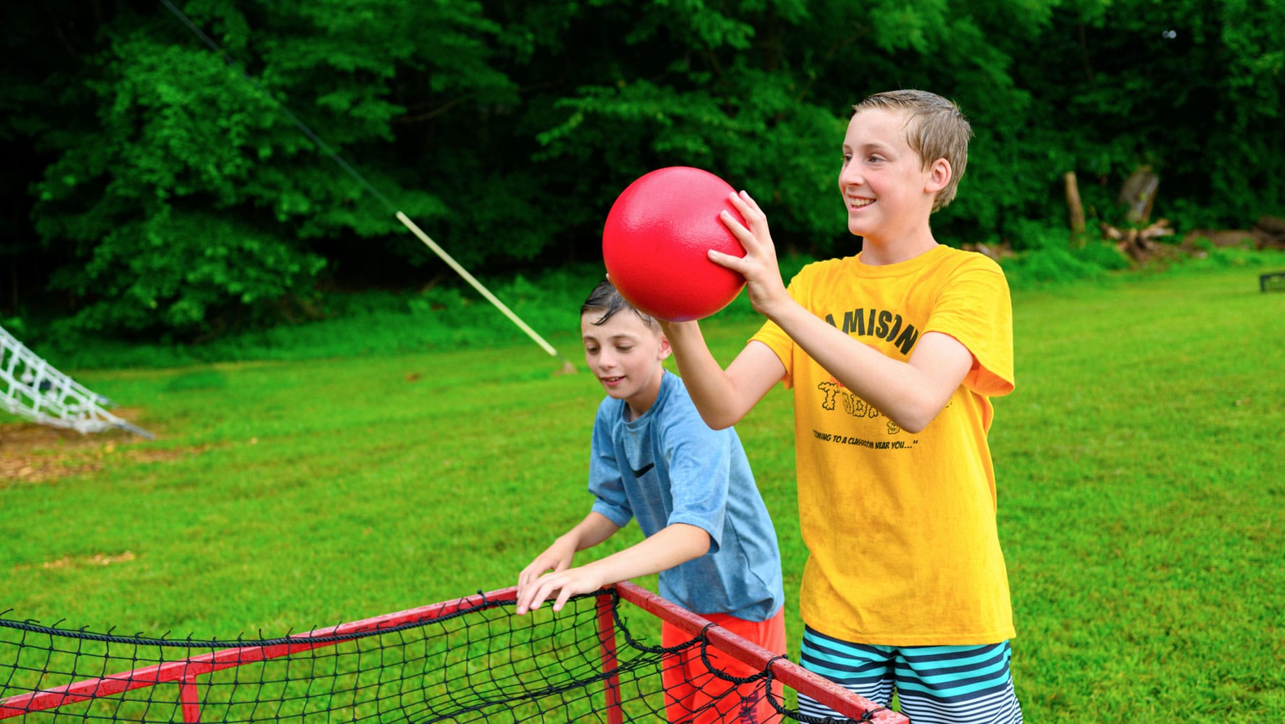 Upper camp boys playing basketball