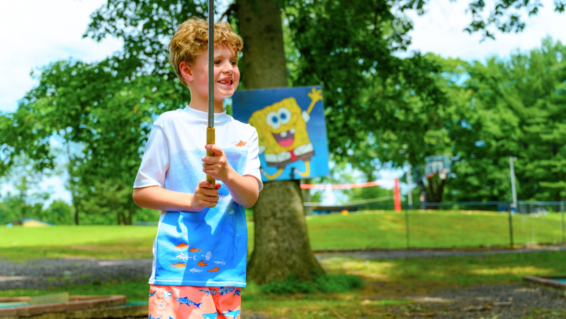 Boy golfing