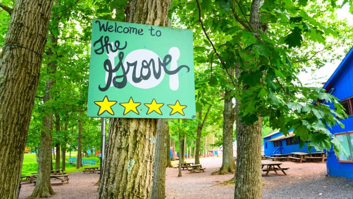 The Grove sign by picnic area