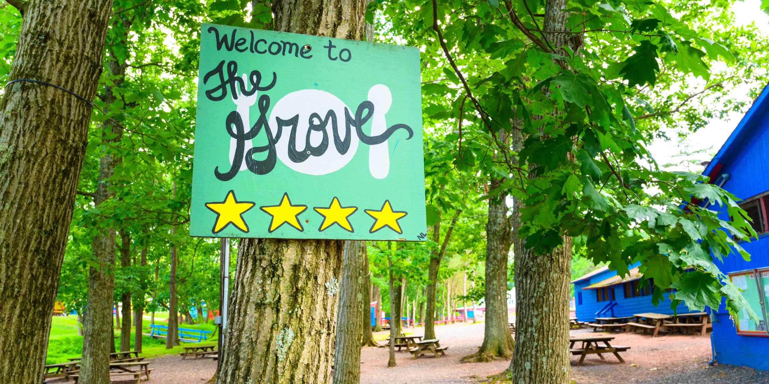 The Grove sign by picnic area