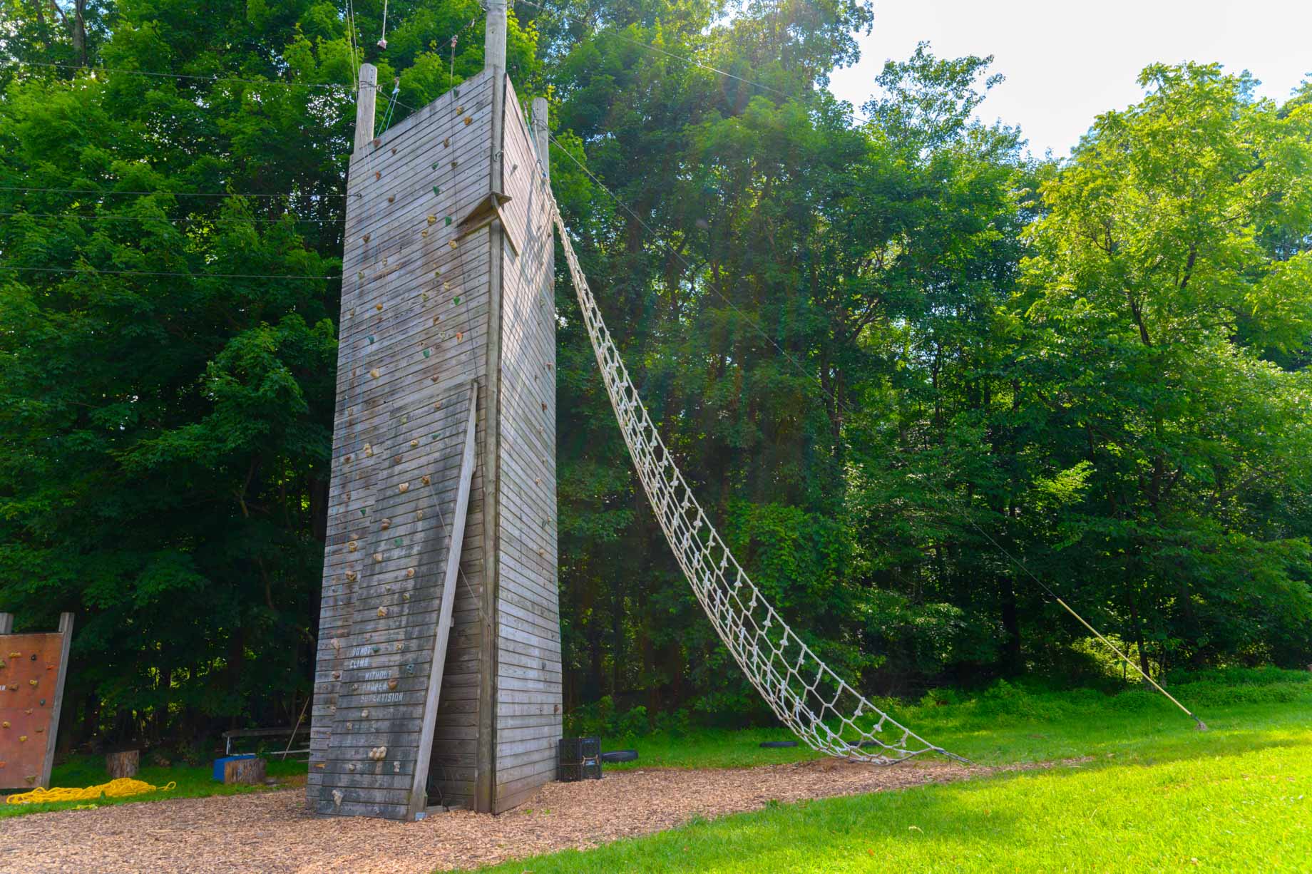 Climbing tower and rope ladder