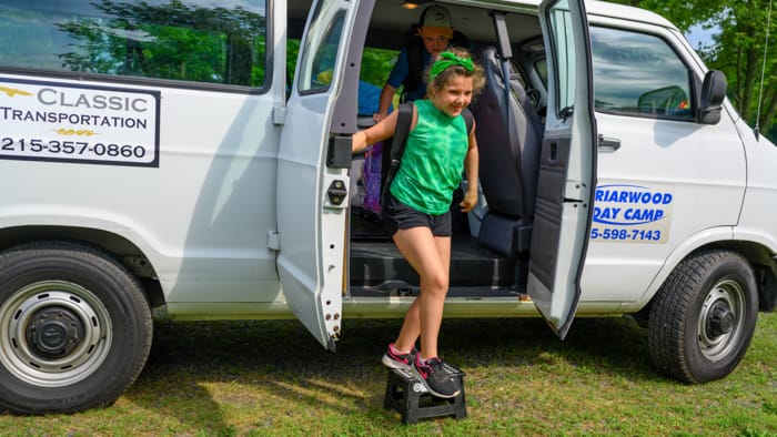 Camper getting out of camp van