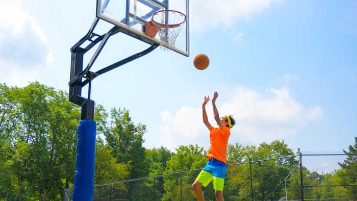 Camper playing basketball