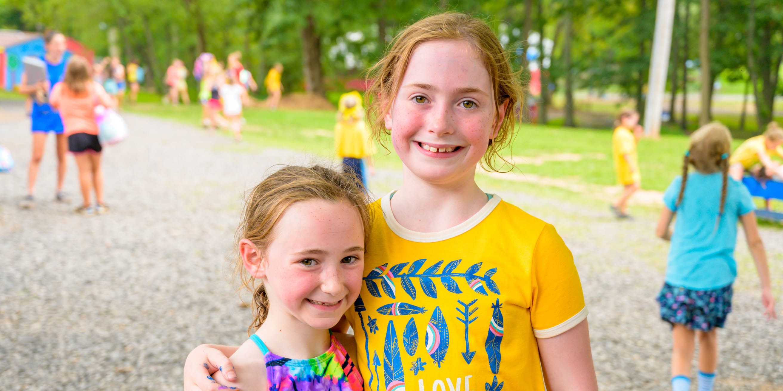 Two girls smiling