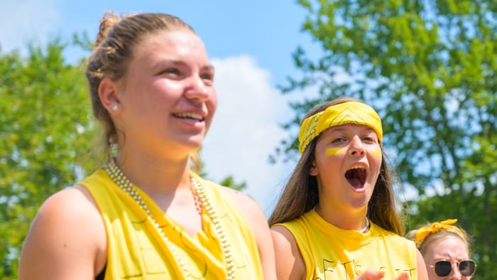 Yellow team cheering at color war