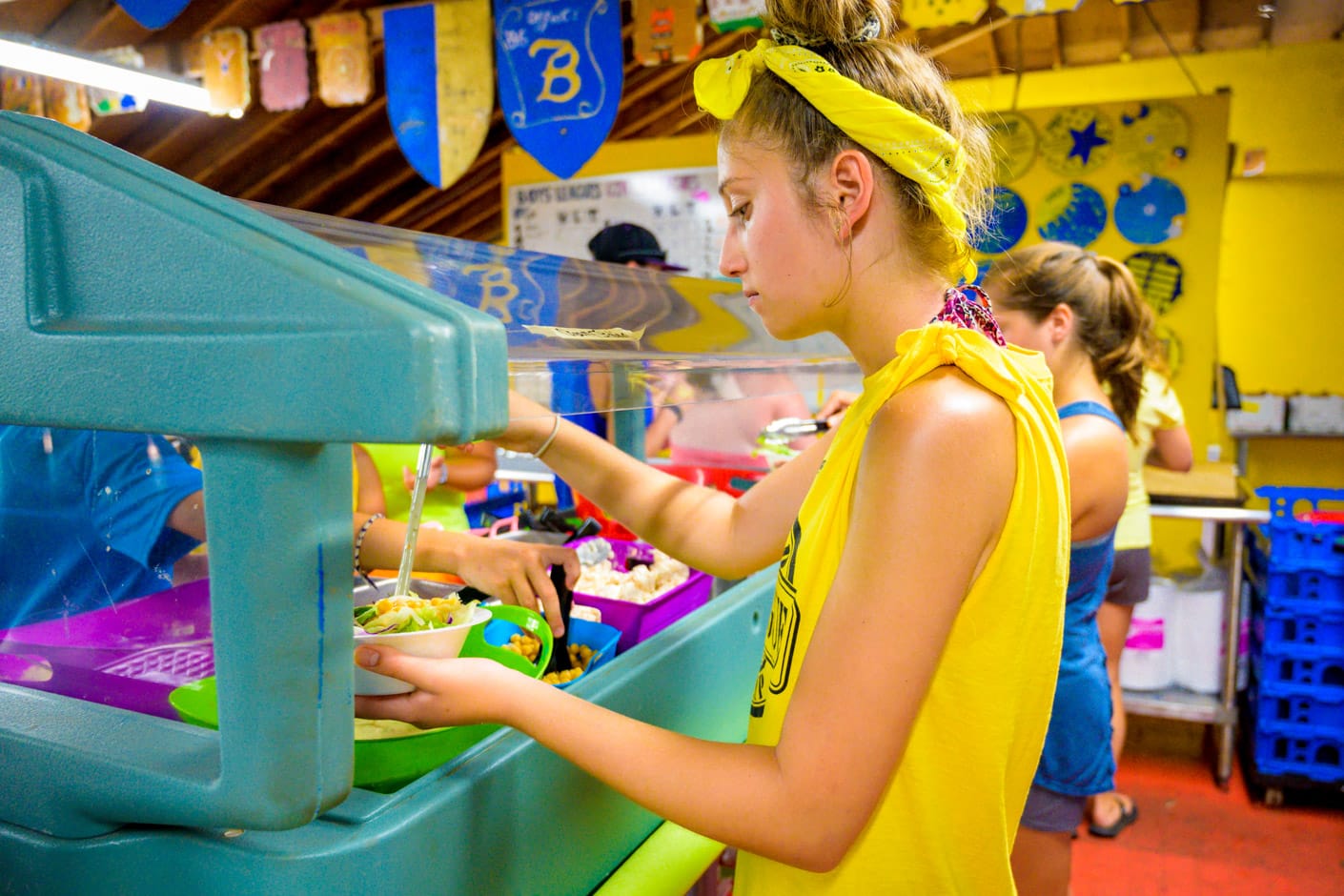 Serving food from the salad bar