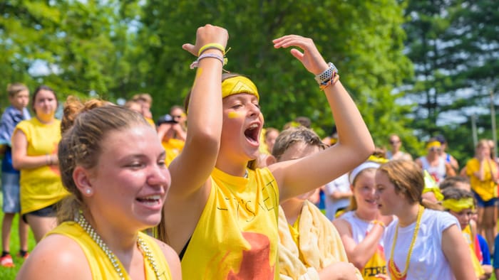 Yellow team cheering at color war