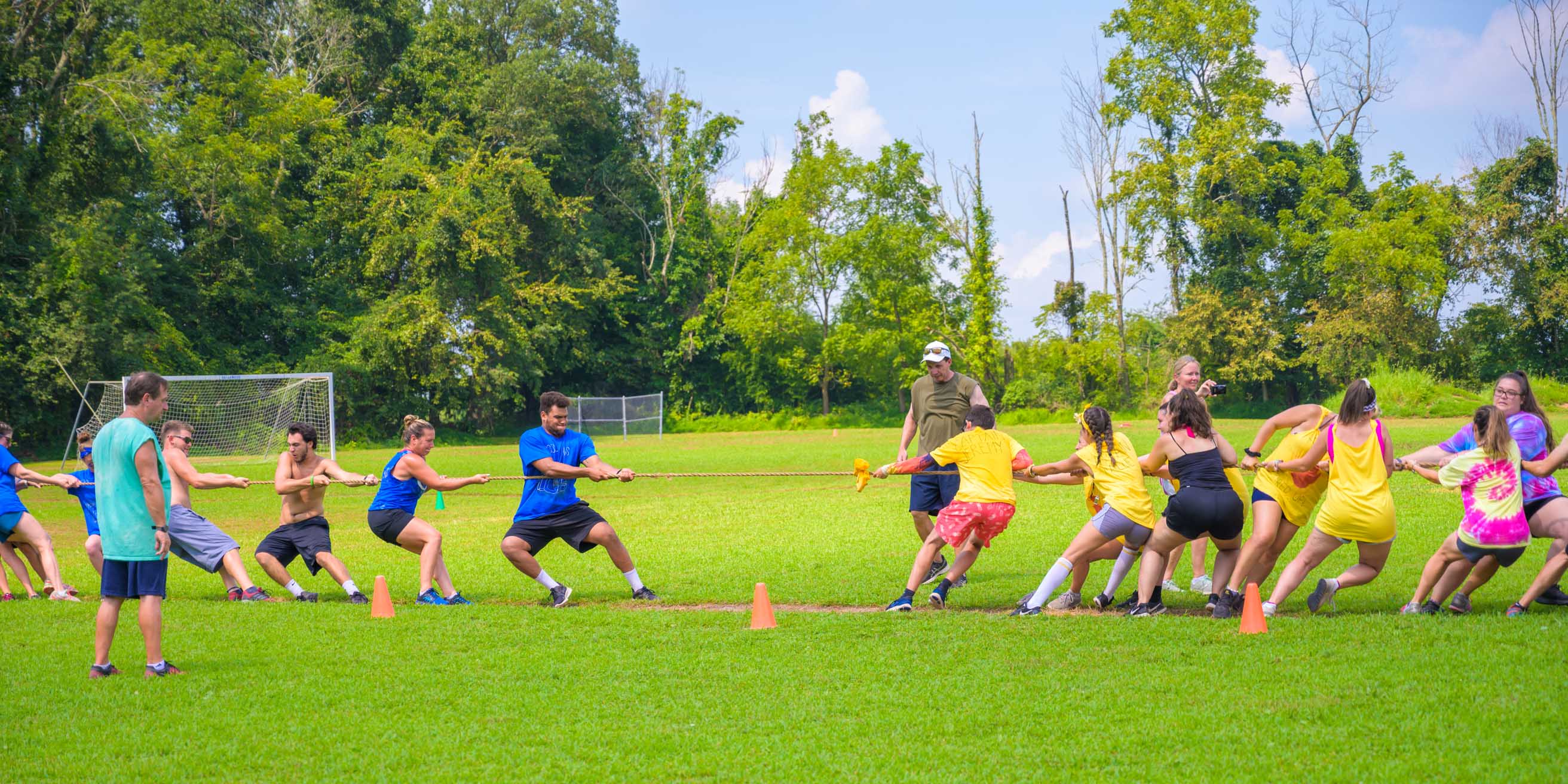 Staff playing tug-of-war during color war