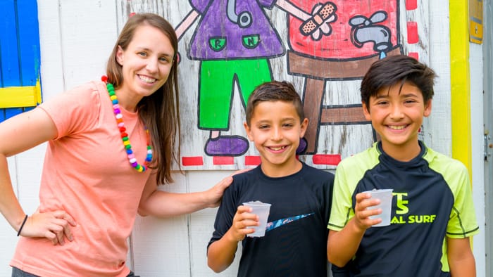 Campers with staff drinking water