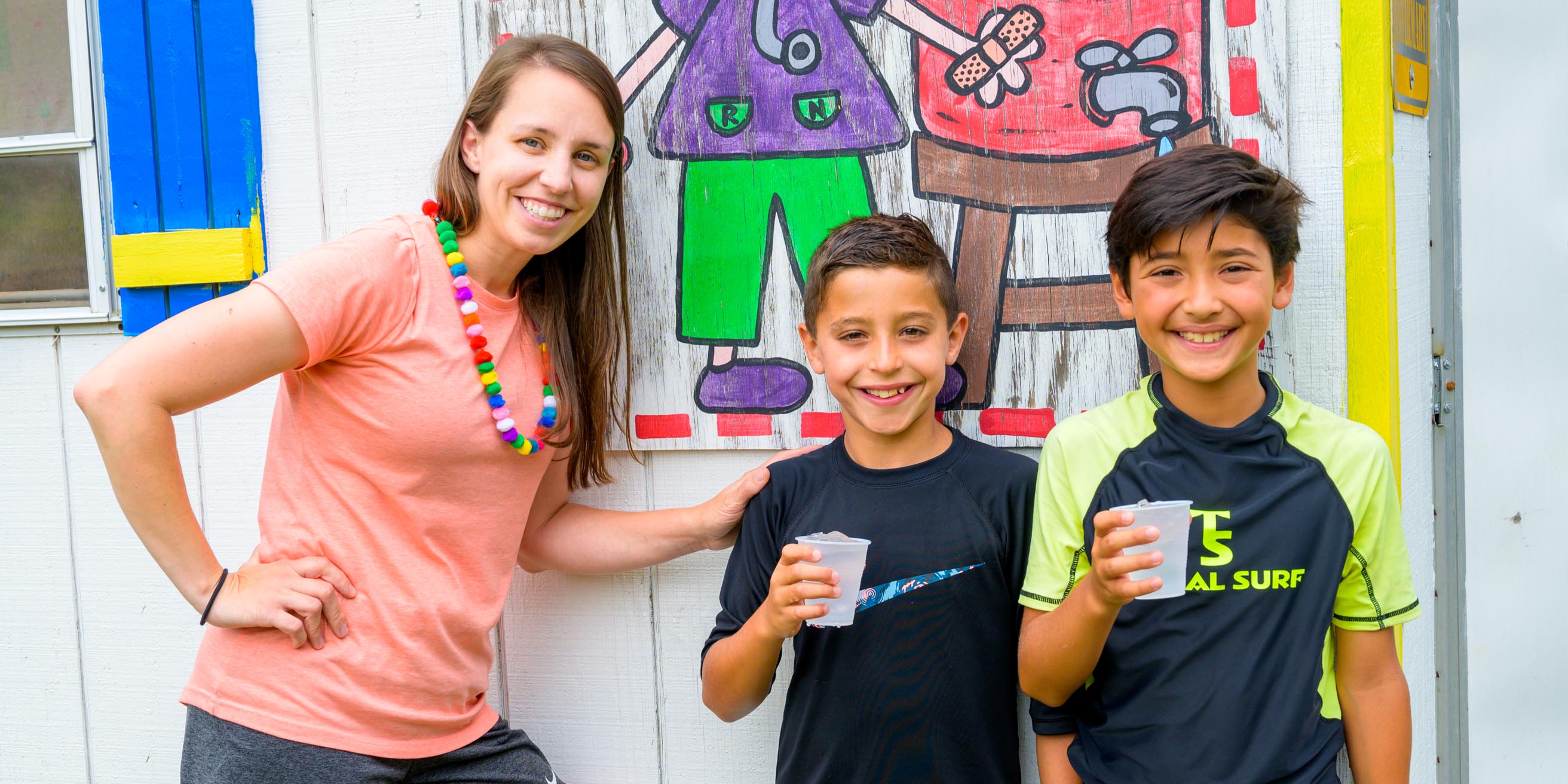 Campers with staff drinking water