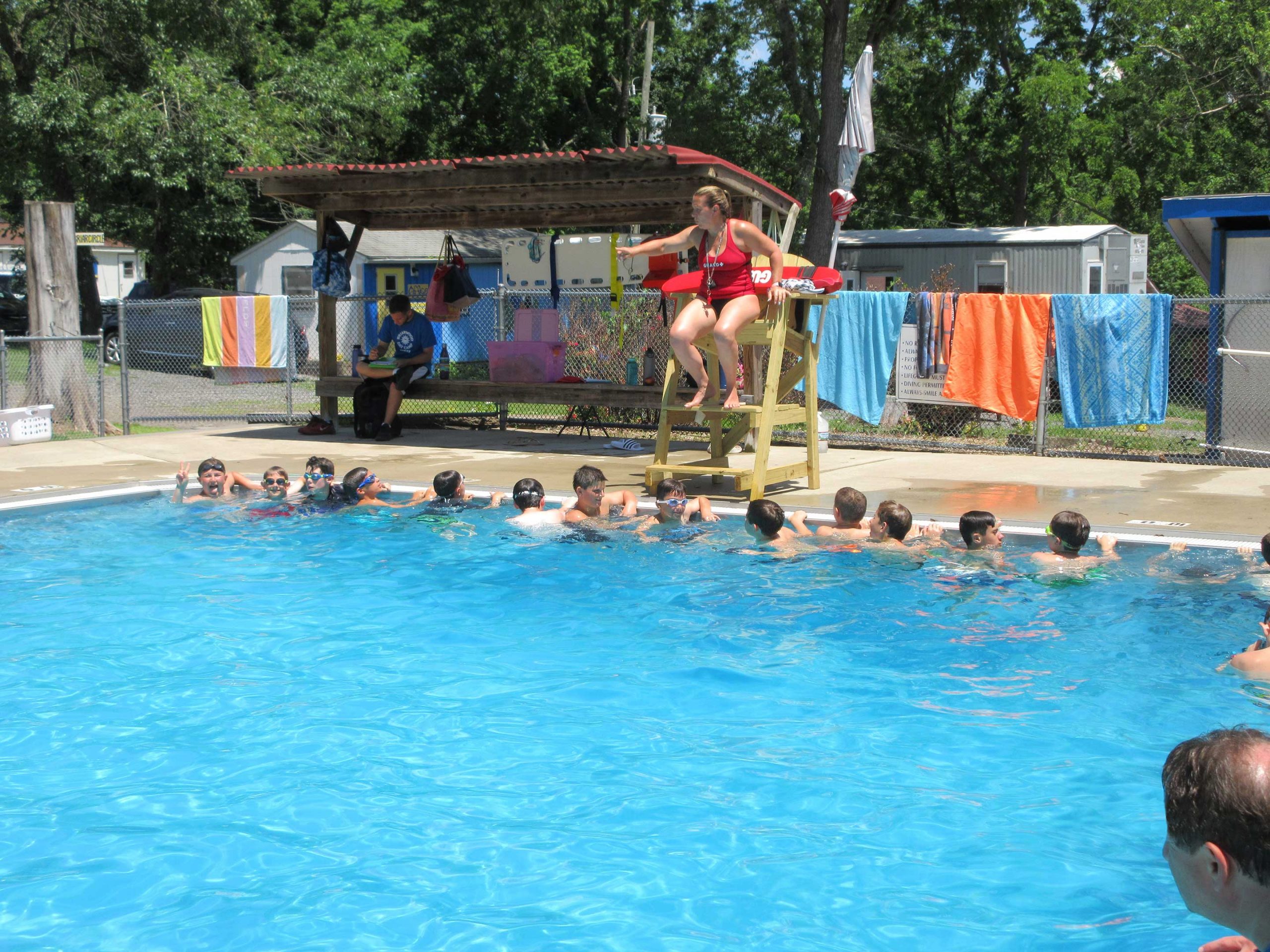 kids learning to swim at Briarwood Day Camp